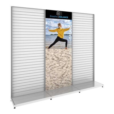 Single sided slatwall retail display fixture with graphic panel for product display